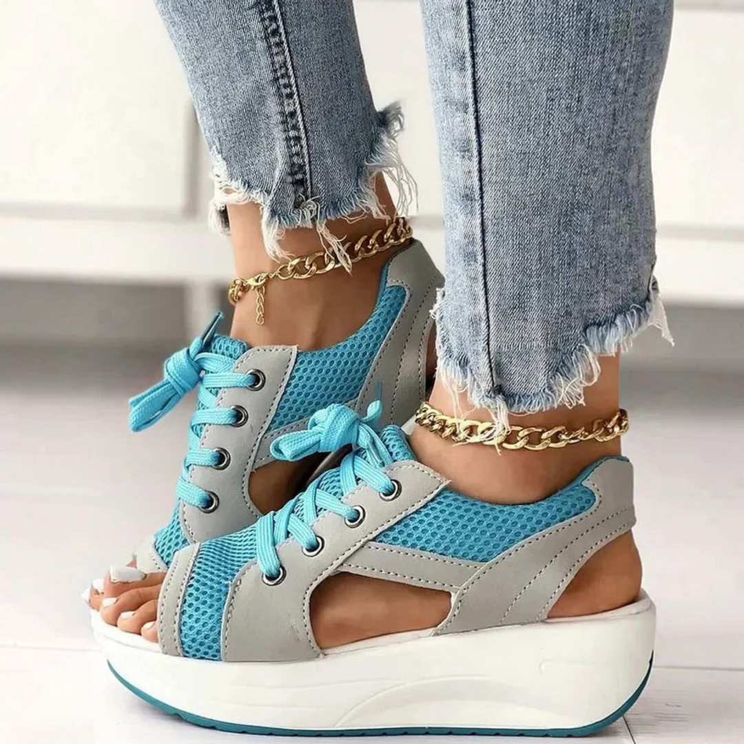 Women's casual lace-up cutout sandals with stylish contrast panels, peep toe & a comfortable muffin platform.