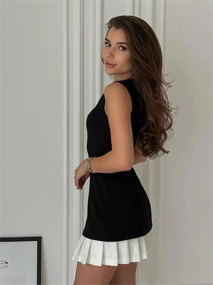 Fitted women's mini dress, sleeveless with crew neck & contrast pleated hem, perfect for parties or fashion.