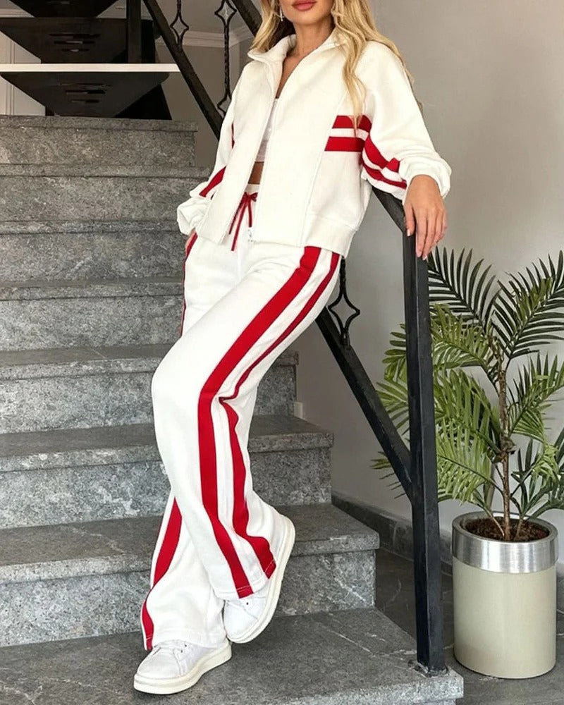 Detail of contrast stripes on a women's cozy zip-up tracksuit set, perfect for stylish lounge wear.