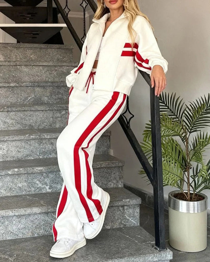 Detail of contrast stripes on a women's cozy zip-up tracksuit set, perfect for stylish lounge wear.