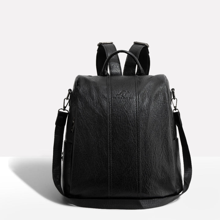 Women's convertible anti-theft backpack with hidden pockets; stylish, secure for everyday carry & travel.