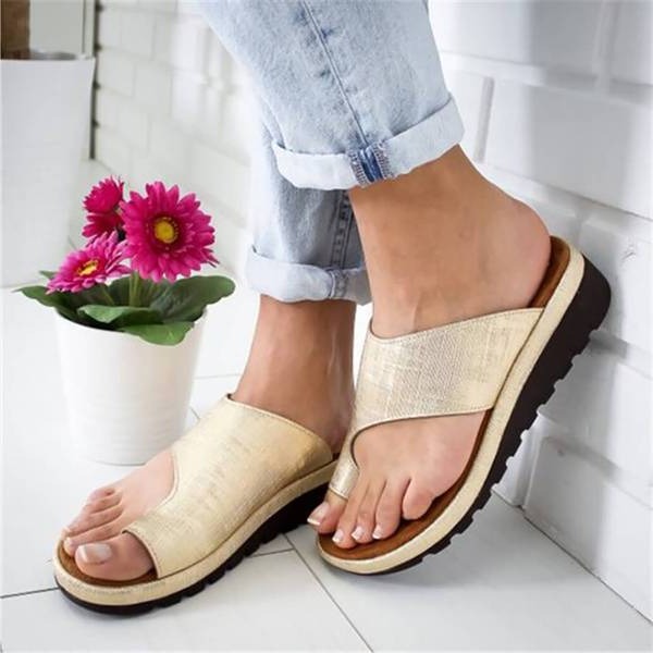 Comfortable women's slip-on sandals with cushioned arch support, ideal for daily wear & foot alignment.