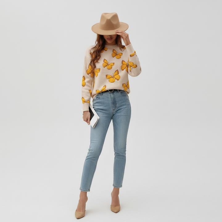 Women's knitwear with delicate butterfly pattern, offering a chic yet relaxed look for daily wear
