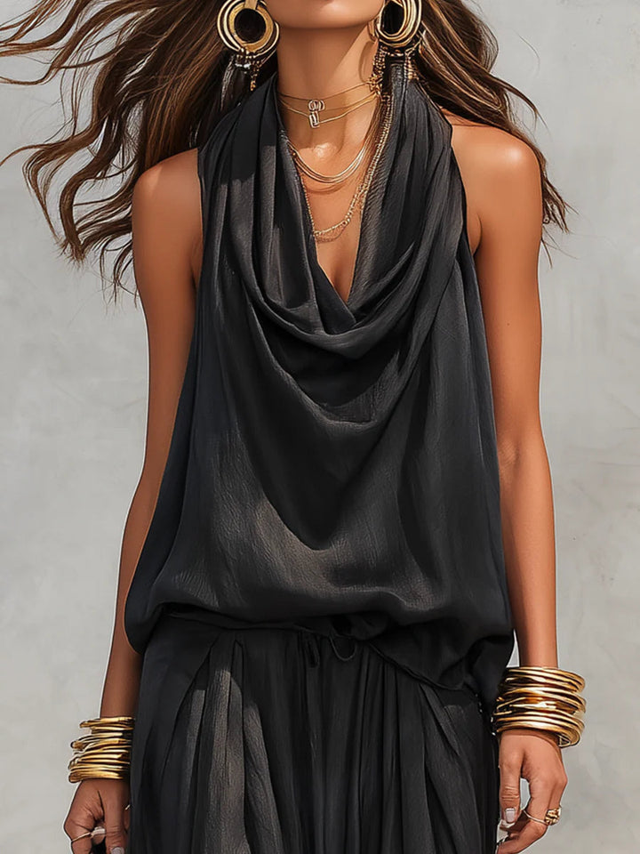 Stylish women's summer two-piece outfit: a trendy cowl neck halter top paired with comfortable wide leg pants.