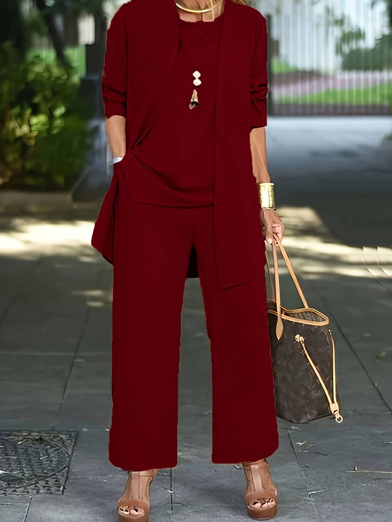 Women's cozy 3 piece loungewear set with round neck long sleeve top, wide leg pants & matching cami for ultimate comfort.