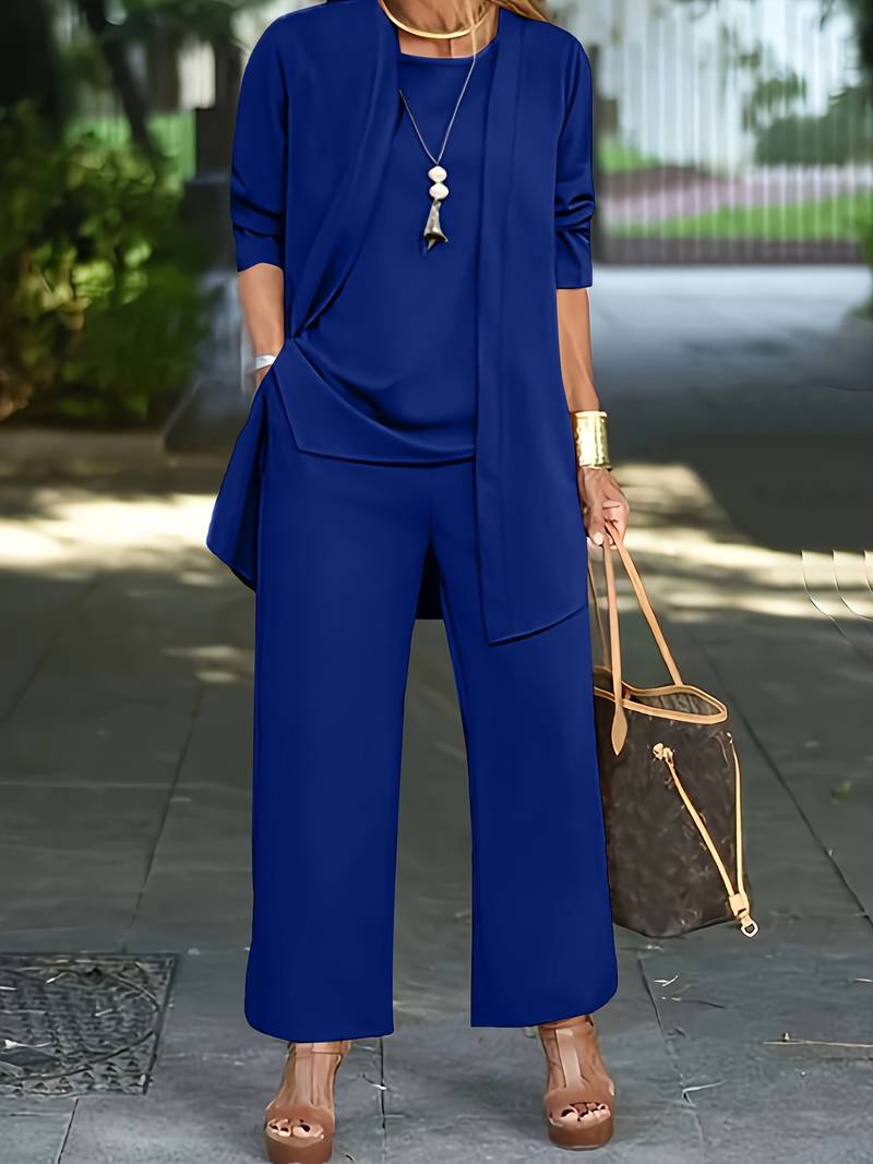 Women's coordinated round neck long sleeve top, wide leg pants & camisole loungewear set. Perfect for relaxing.