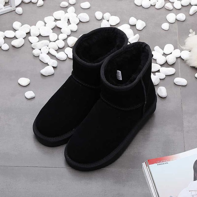 Women's cozy ankle snow boots, warm & comfortable winter footwear. Stylish for daily cold weather.