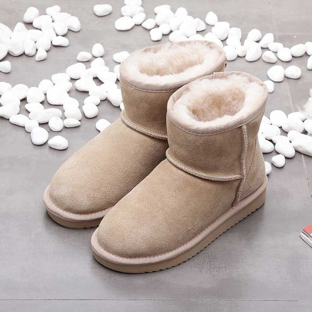 Stylish women's ankle snow boots, made from durable leather. Warm & comfortable for winter daily wear.
