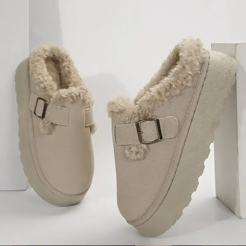 Stylish women's slip-on clogs featuring a decorative buckle, offering supportive and cozy comfort for casual wear.
