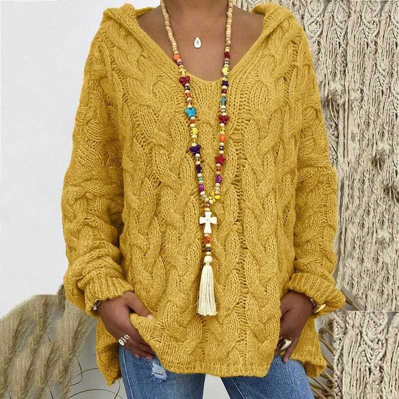 Women's cozy cable knit sweater in a classic design, perfect for timeless winter style.
