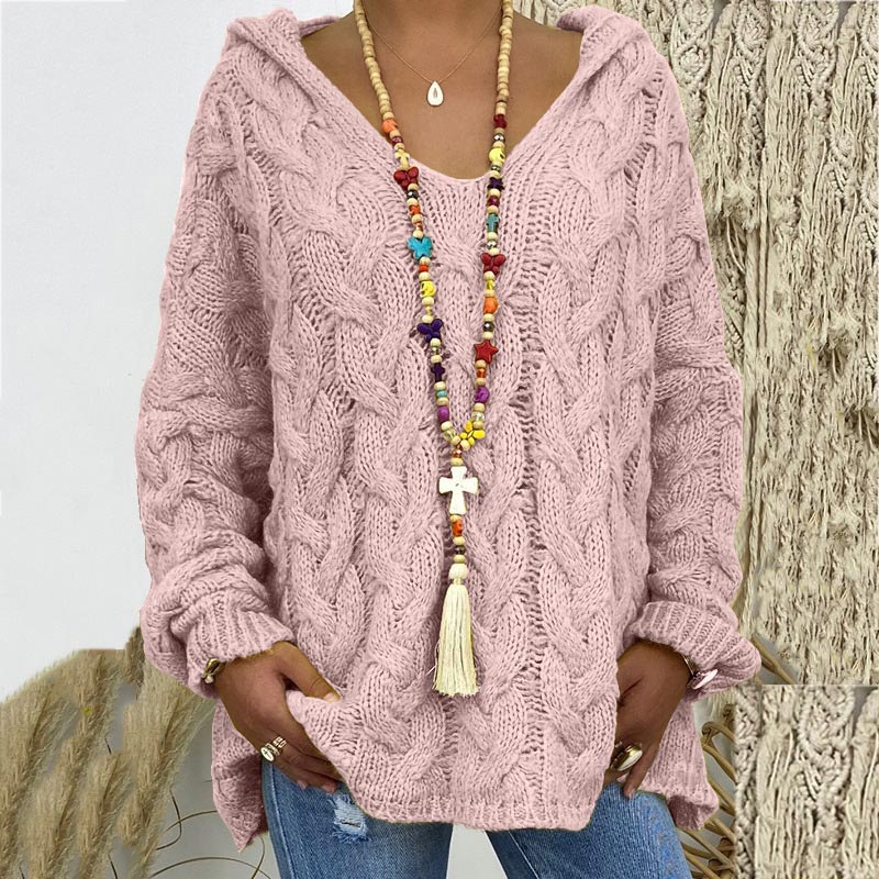 Comfortable women's long sleeve cable knit sweater, a cozy and essential winter staple.