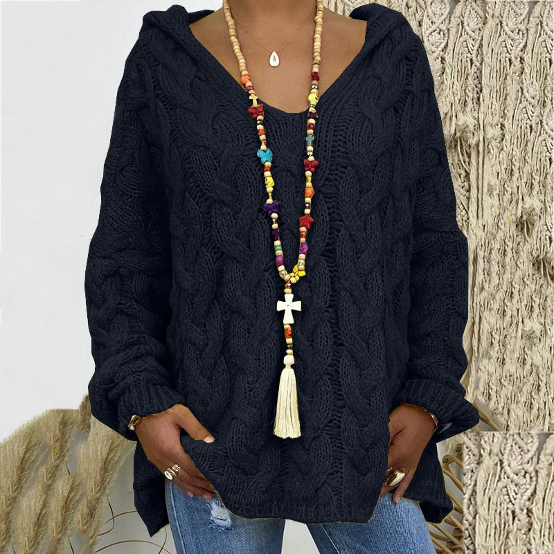 Timeless women's cozy cable knit sweater, an elegant long sleeve and warm winter essential.