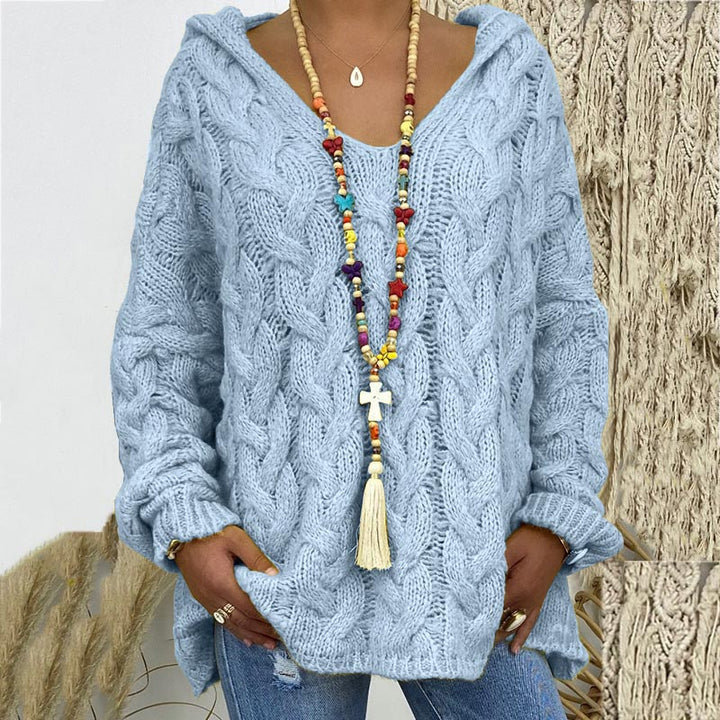 Soft and comfortable women's cable knit sweater, a cozy everyday winter pullover choice.