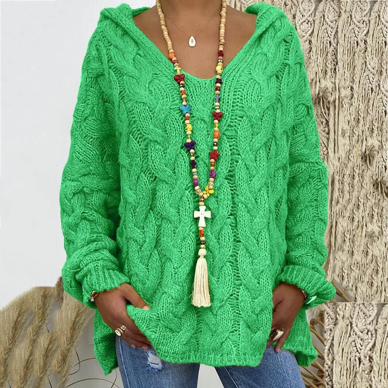 Stylish women's cable knit sweater, a classic winter fashion statement with a relaxed fit.