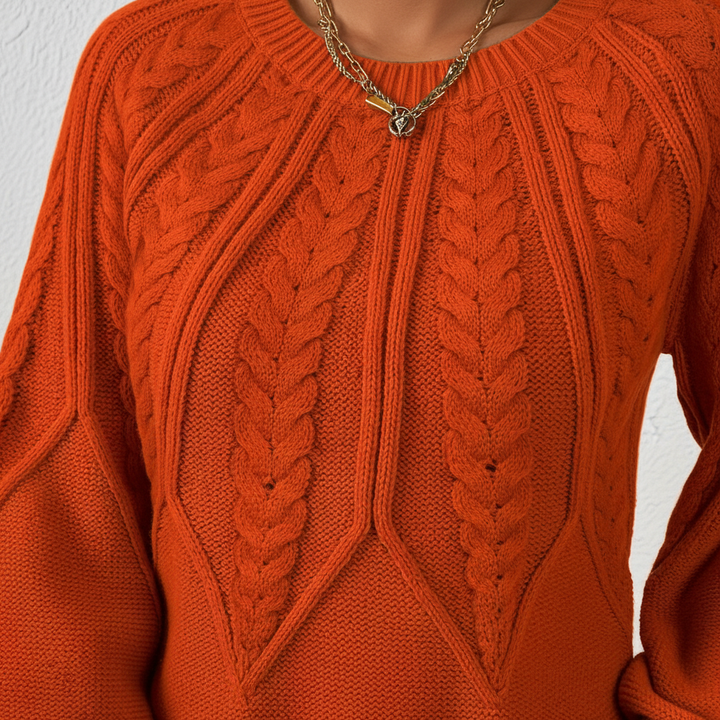 Side view of women's lantern sleeve cable knit sweater, regular fit for comfortable autumn wear