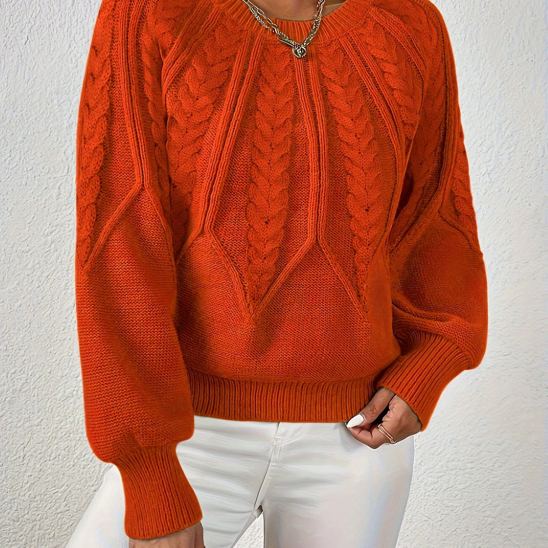 Woman wearing a cozy cable knit pullover, styled for elegant winter fashion, Karin sweater