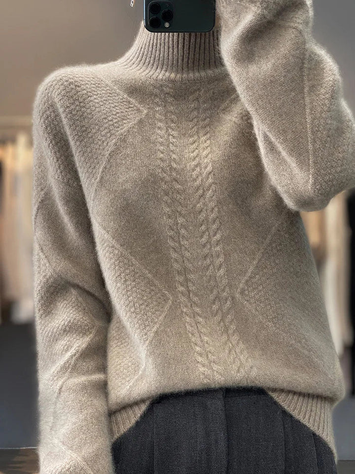 Women's classic cable-knit turtleneck sweater. Soft, warm, and perfect for a stylish winter wardrobe.