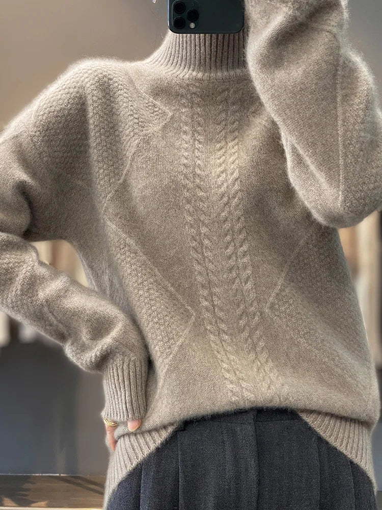 Chic women's cable-knit turtleneck sweater. A cozy and elegant knit top for winter and fall apparel.