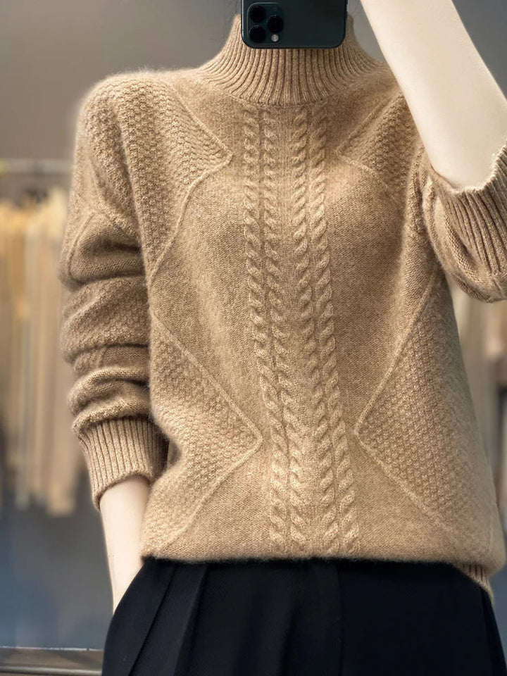 Luxurious women's cable-knit turtleneck sweater. Enjoy its warmth & comfort as a stylish winter staple.