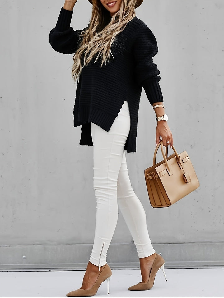 Cream chunky knit women's pullover sweater, offering a relaxed fit and ultimate comfort for winter.