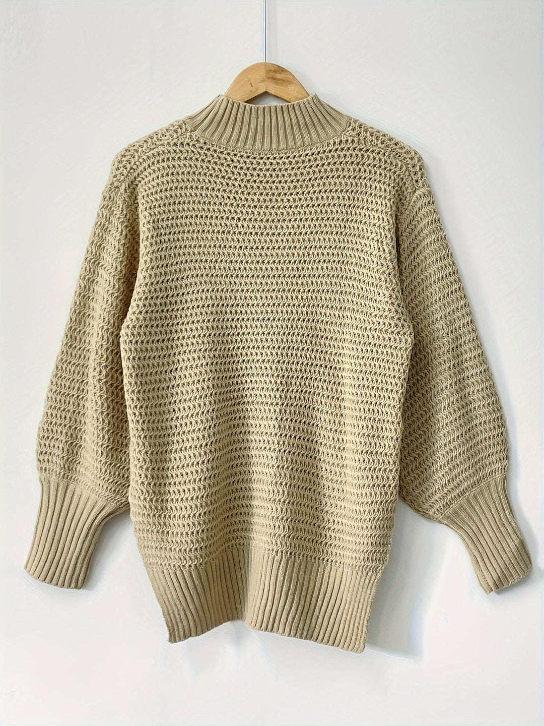 Navy blue women's cozy chunky knit pullover, versatile for layering and everyday casual fashion.