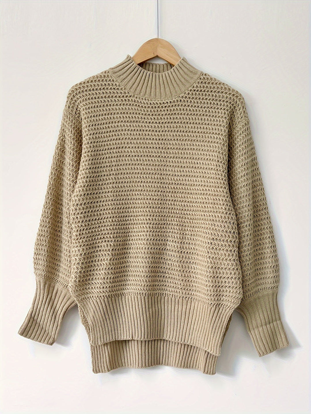 Comfortable women's chunky knit pullover sweater, featuring a relaxed fit for cozy winter style.