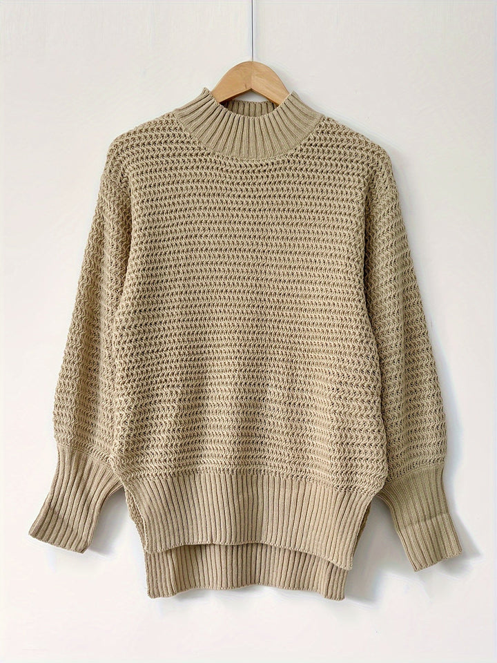 Comfortable women's chunky knit pullover sweater, featuring a relaxed fit for cozy winter style.
