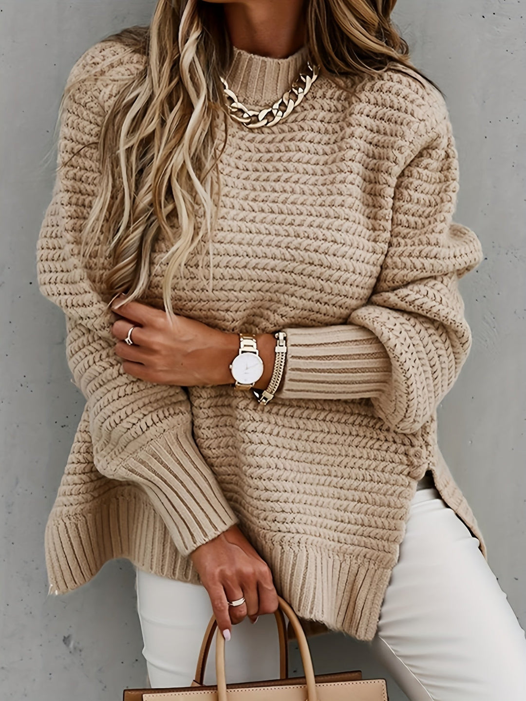 Fashionable oversized chunky knit pullover for women, great for casual wear and warm layering.