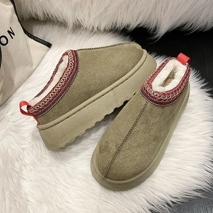 Durable anti-slip sole on women's comfort mules, ensuring safety and warmth for indoor-outdoor wear.
