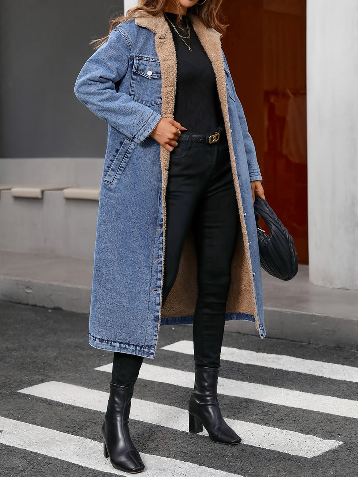 Washed blue cropped denim jacket with soft lining for women, offering cozy comfort & stylish outerwear.