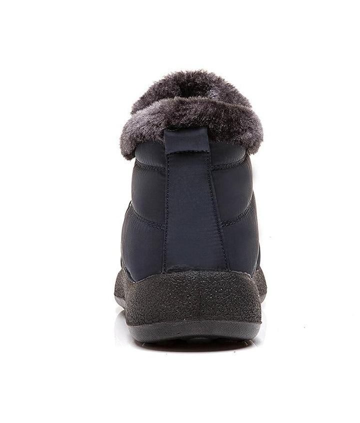 Woman wearing cozy & durable winter boots, showcasing everyday style for cold weather adventures.