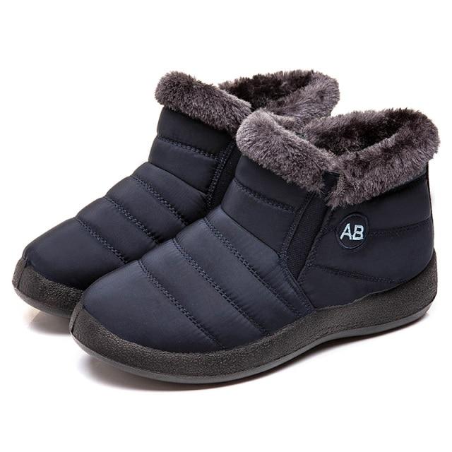 Detail of secure lacing system on women's durable winter boots, perfect for cold weather.