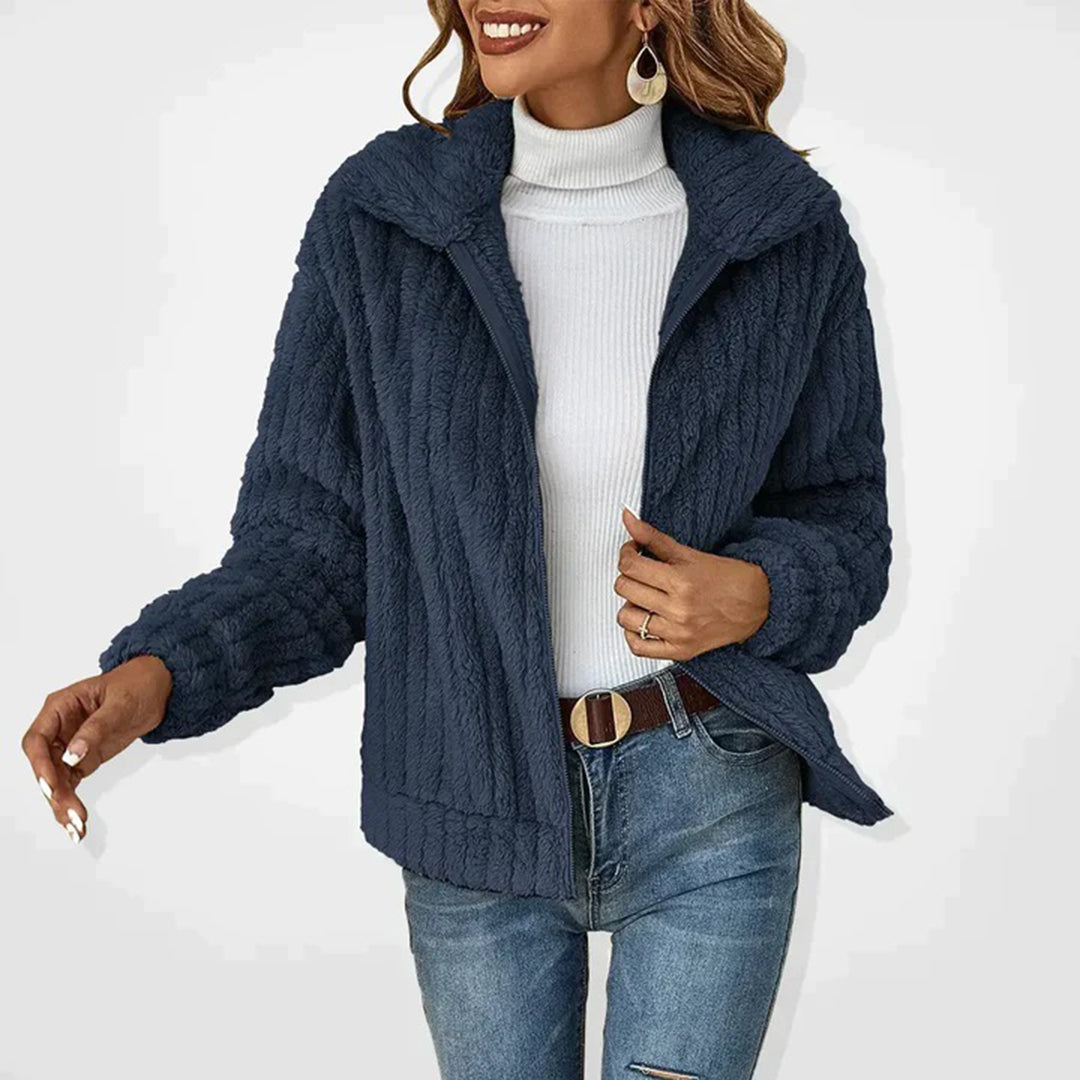 Soft women's Ember fleece vest, versatile for layering, outdoor activities & cozy casual autumn comfort.