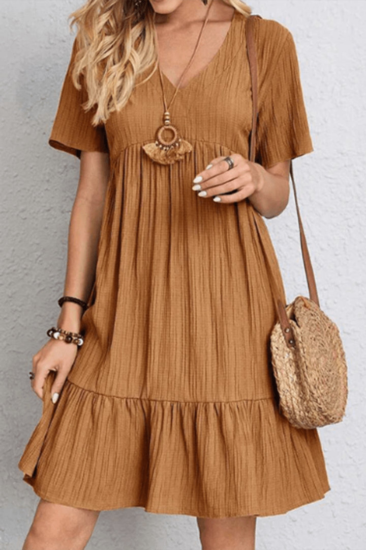 Chic women's midi dress for versatile day-to-night wear. Elegant, comfortable, & minimalist fashion.