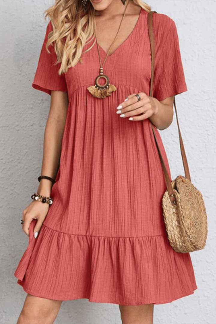 Relaxed fit women's midi dress, offering comfortable, chic style for everyday and casual occasions.
