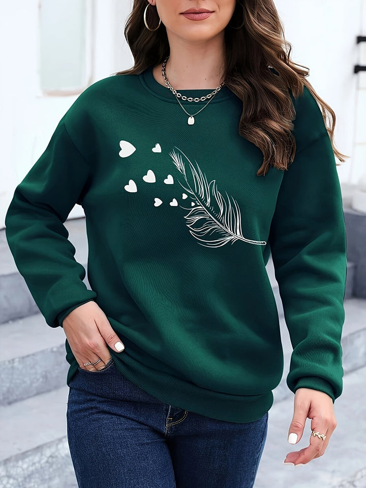 Women's cozy feather print casual sweatshirt. Stylish long sleeve pullover for autumn/winter.