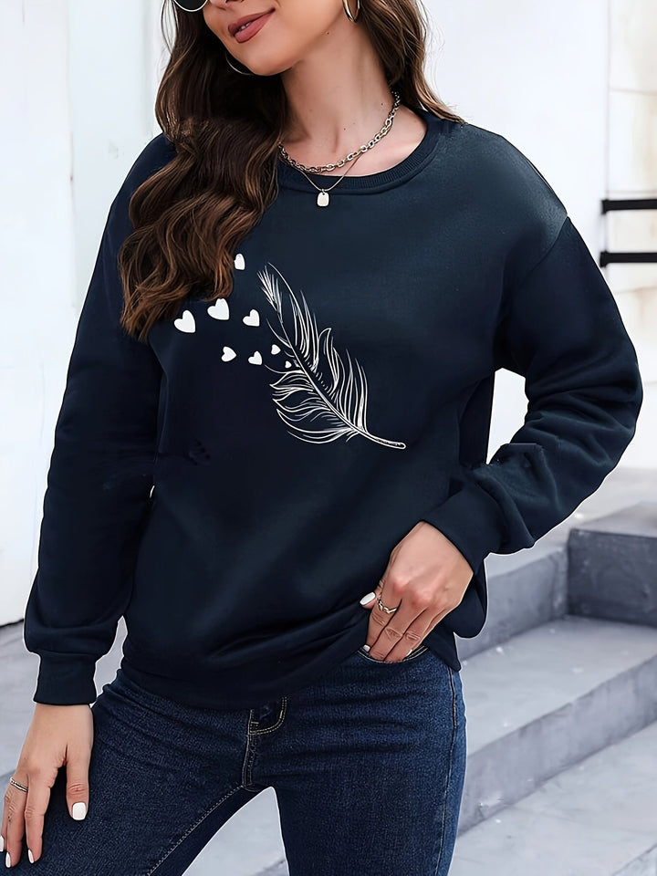Stylish women's feather print casual sweatshirt. Soft long sleeve pullover for cozy autumn wear.