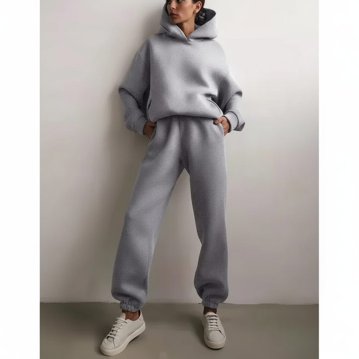 Stylish women's loungewear set; a fleece hoodie and jogger pants for ultimate comfort.