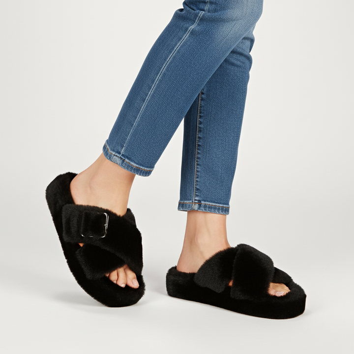 Women's plush fleece slippers, ideal for cozy evenings and cold weather comfort