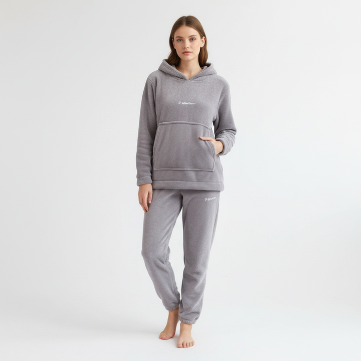 Fashionable women's lounge outfit: a soft fleece hoodie and coordinating sweatpants.