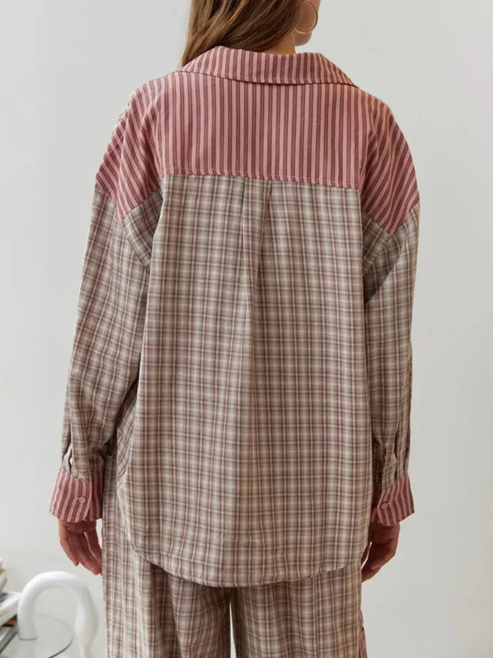Women's cozy fleece pajama set, soft & warm sleepwear perfect for comfortable winter nights.