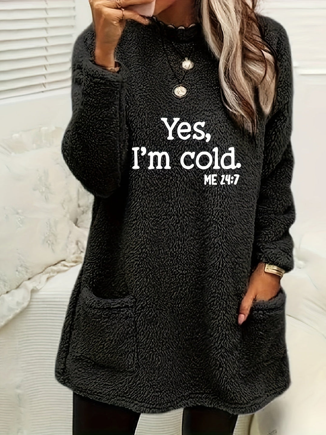 Women's cozy fleece sweatshirt with a unique, playful graphic print; warm, long-sleeve crew neck for winter fashion.