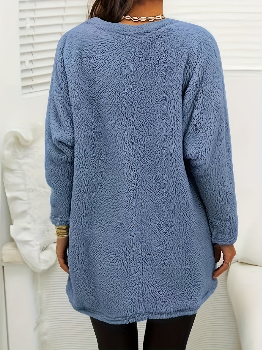 Warm & playful women's fleece sweatshirt with an eye-catching print; a comfortable long-sleeve top for daily style.