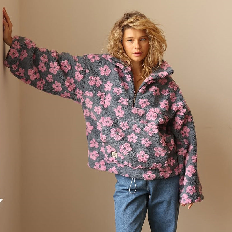 Warm women's sherpa fleece pullover with cozy floral pattern, ideal comfort wear for fall.