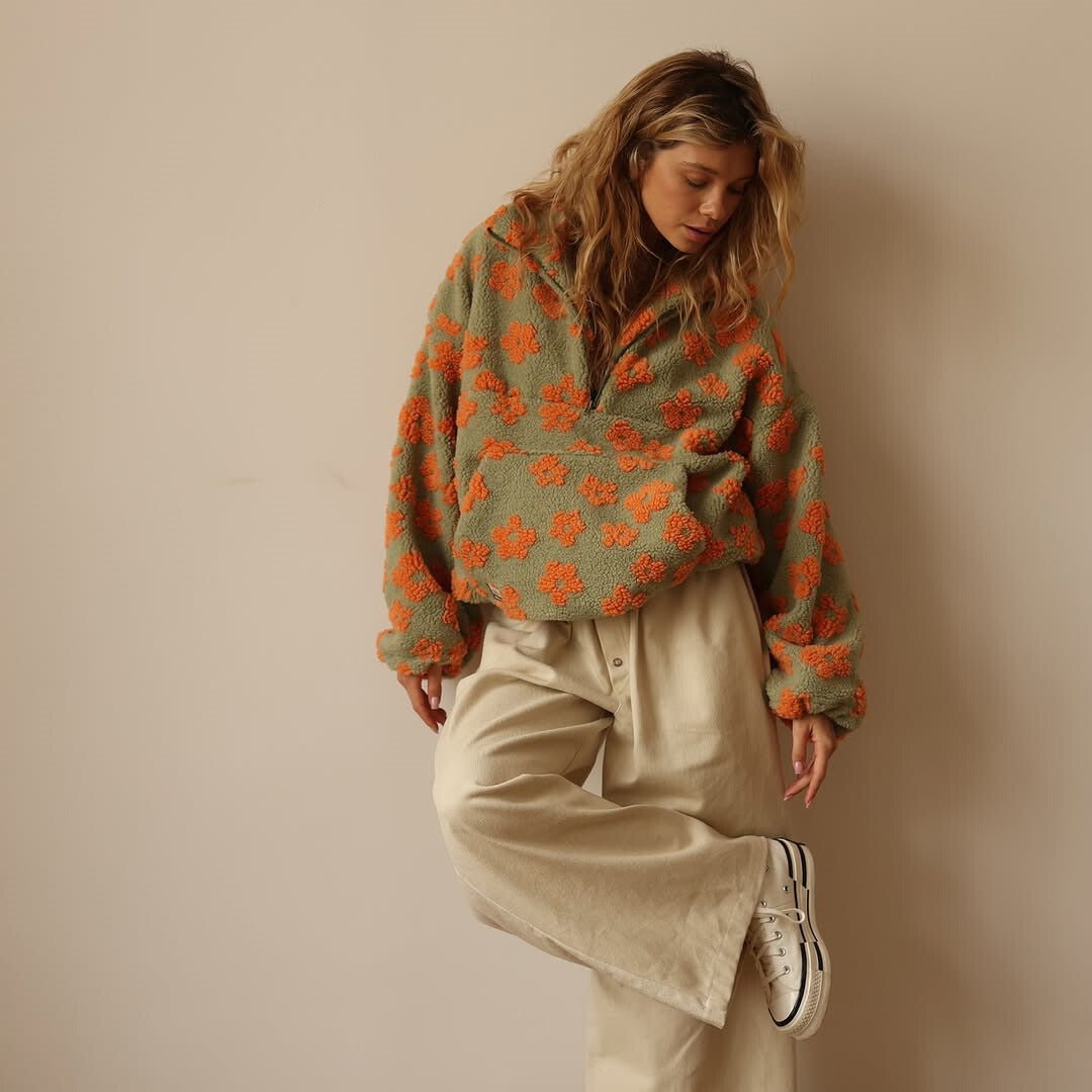 Oversized women's floral fleece pullover sherpa top. Cozy, casual, and warm for autumn.