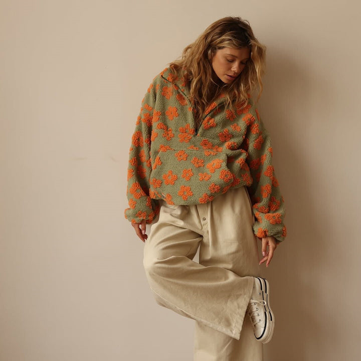 Oversized women's floral fleece pullover sherpa top. Cozy, casual, and warm for autumn.