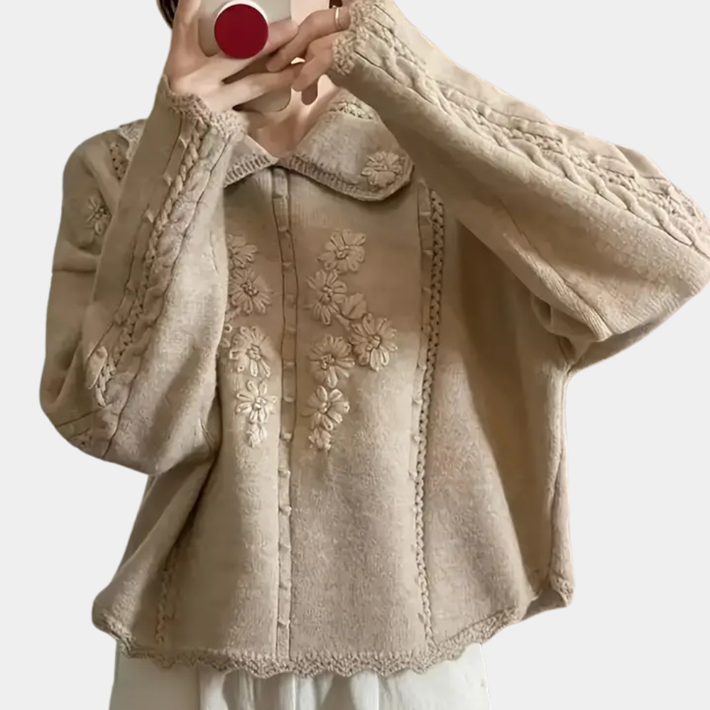 Women's cozy floral pattern sweater, an elegant knitted pullover perfect for fall and winter fashion.
