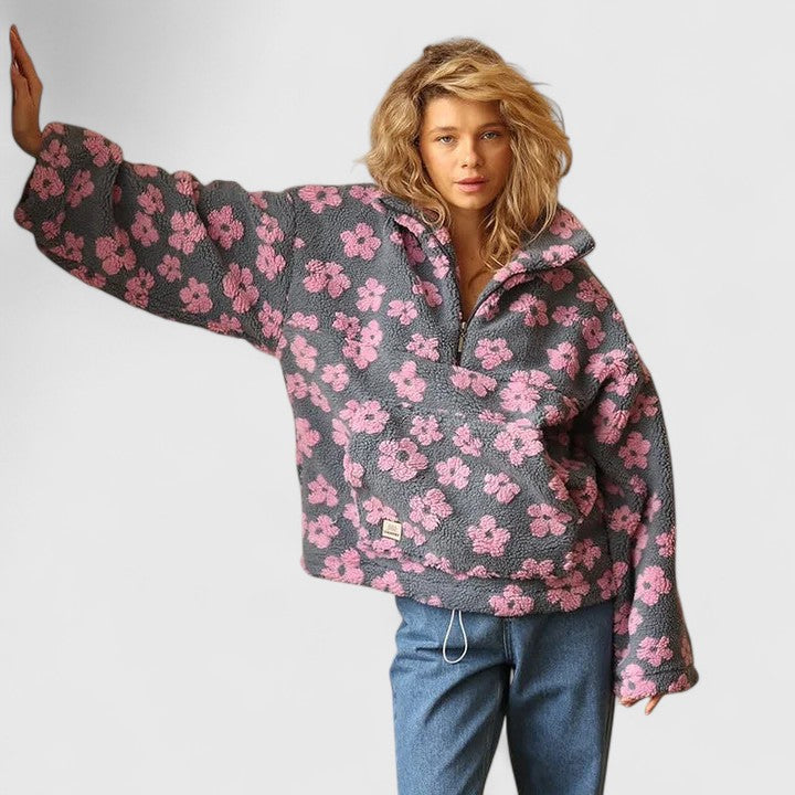 Relaxed fit women's floral quarter-zip sweater. Comfy oversized pullover for casual fall/winter style.