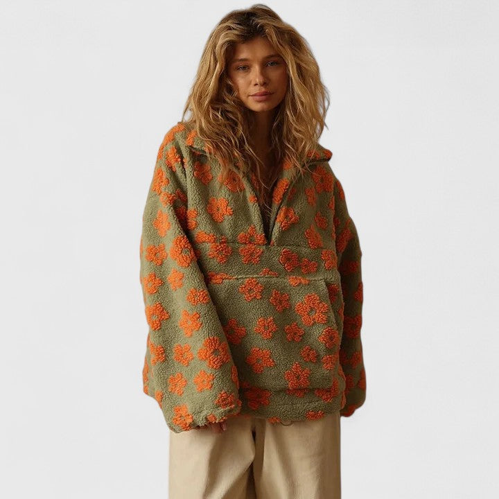 Stylish women's quarter-zip floral pullover. Cozy top, ideal for comfortable winter fashion & casual wear.