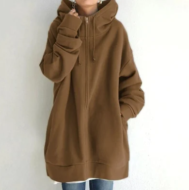 Comfortable women's relaxed fit zip hoodie with hood, perfect for cozy lounge wear or outerwear.